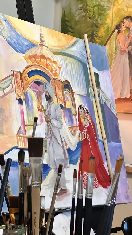 Brushwork in progress on a live wedding painting